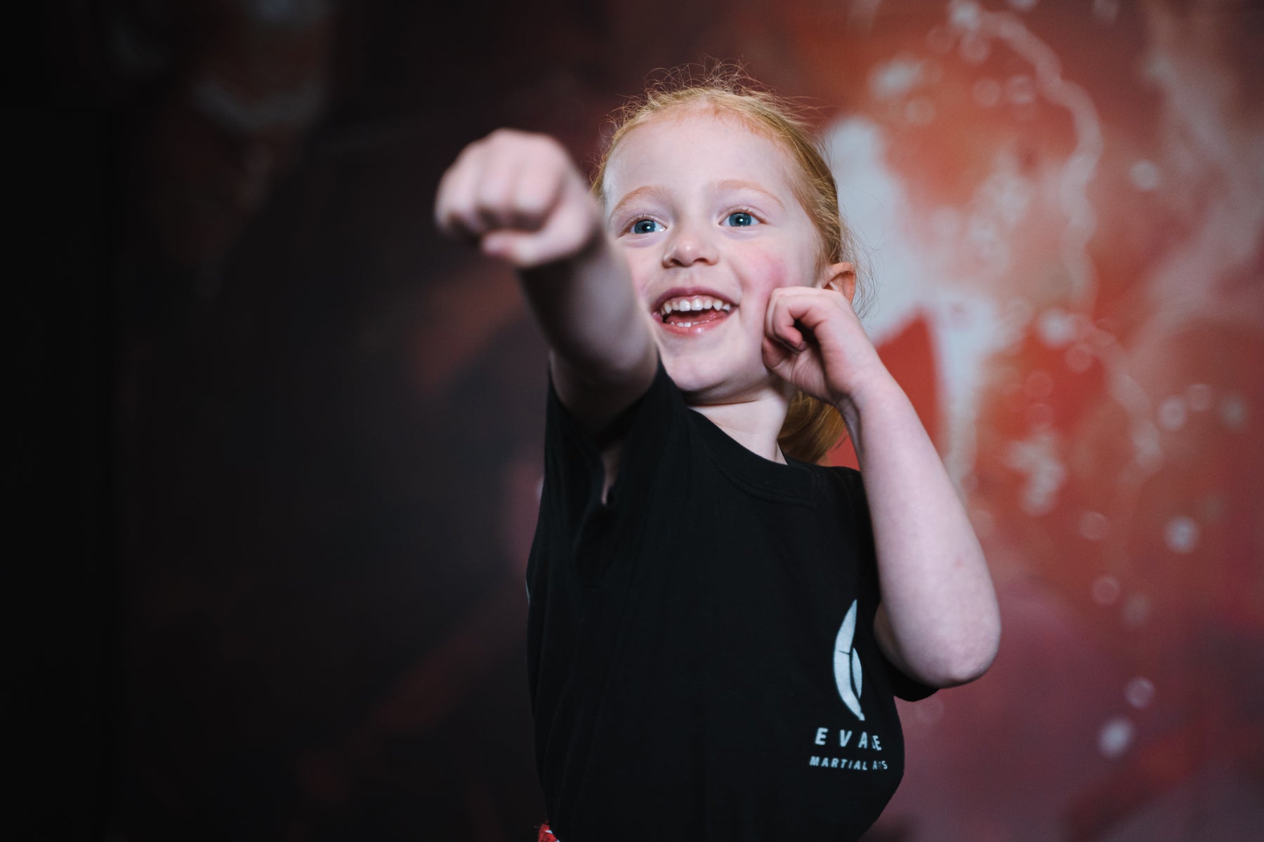 A photo of a young Evade Martial Arts student demonstrating a punch as part of the Evade Martial Arts Tameside and Children's Martial Arts Tameside programs
